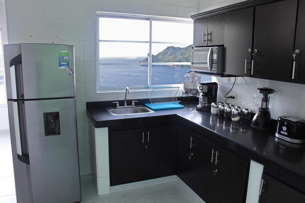 Suitehouse Taganga Luaran gambar